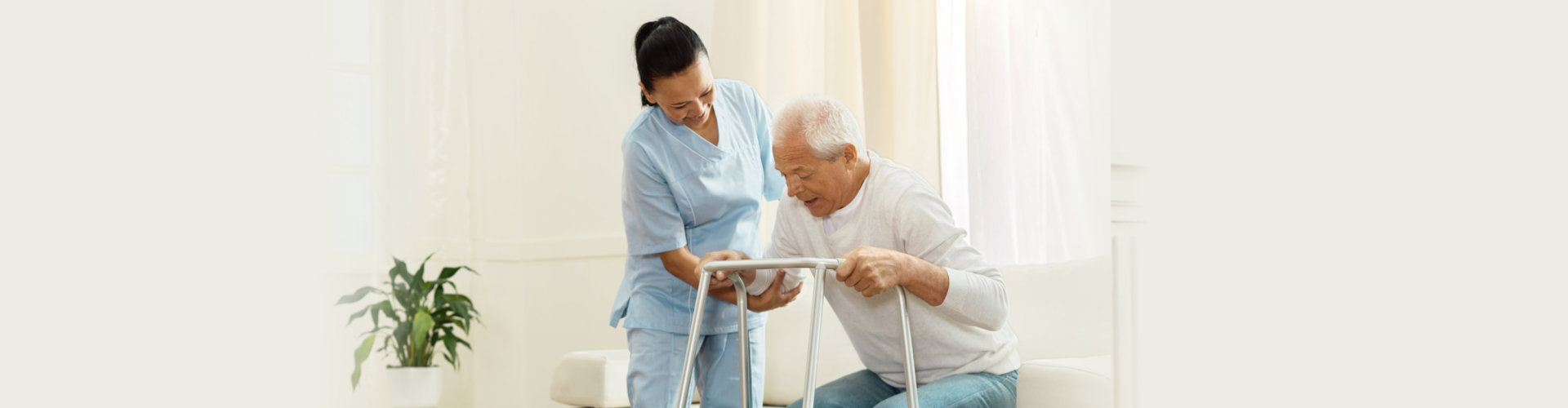 senior man patient assisted by the healthcare staff