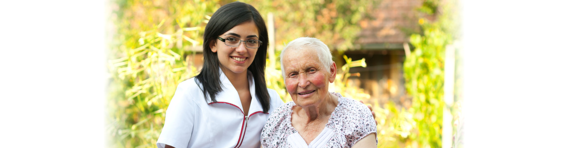 senior woman and the healthcare staff smiling